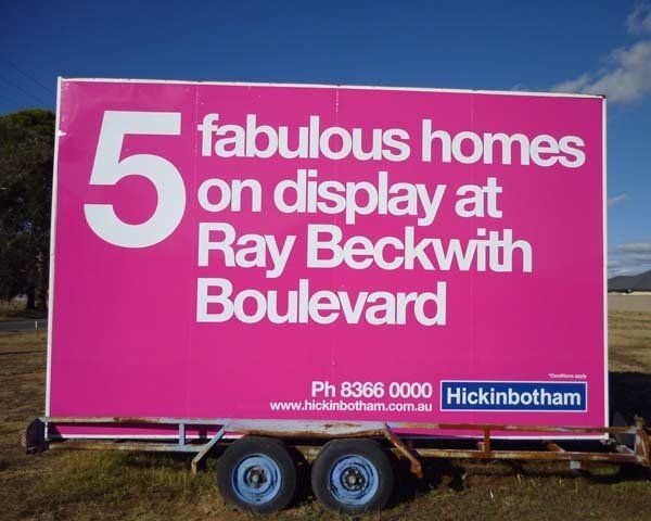 pink towable sign