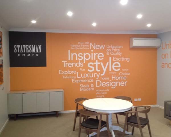 large orange wall with text