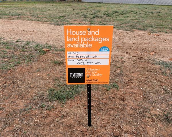 statesman homes plot sign